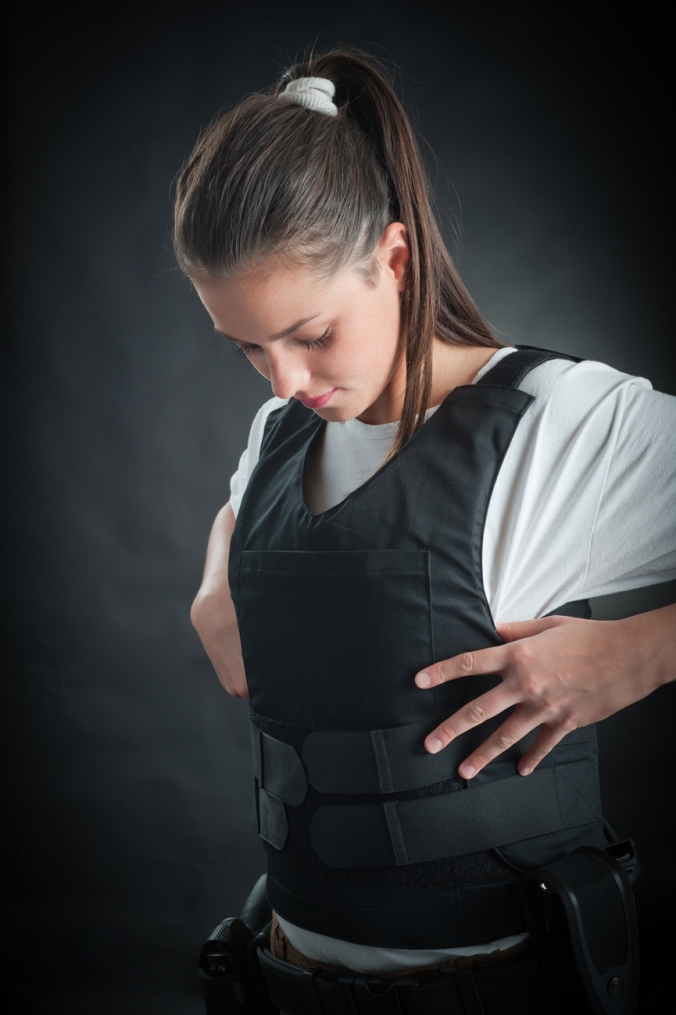 There's nothing magical about body armor (aka bulletproof vests or ballistic vests or bullet-resistant vests or any number of other names). They only protect what they cover, and they offer no guarantees. (Shutterstock photo)